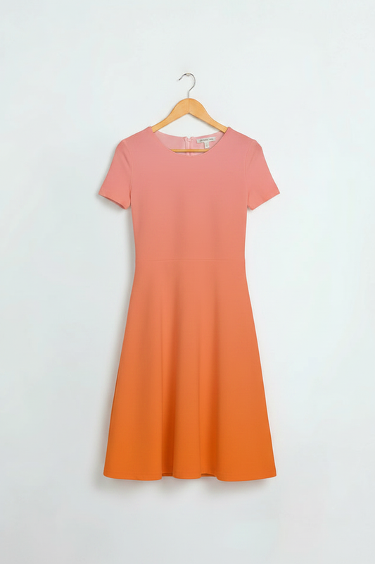 Peach Sunset A-Line Dress - dress on wooden hanger, white studio background