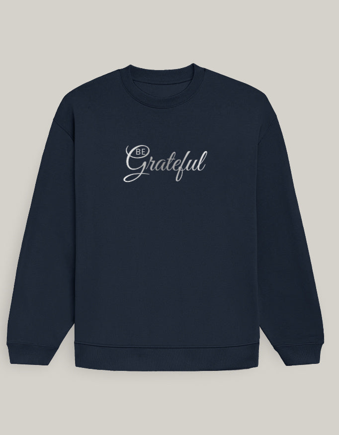 Stay Grateful Women’s Oversized Sweatshirt sweatshirt oversized fit cotton fabric heavyweight fabric detail view by HAViT Apparel