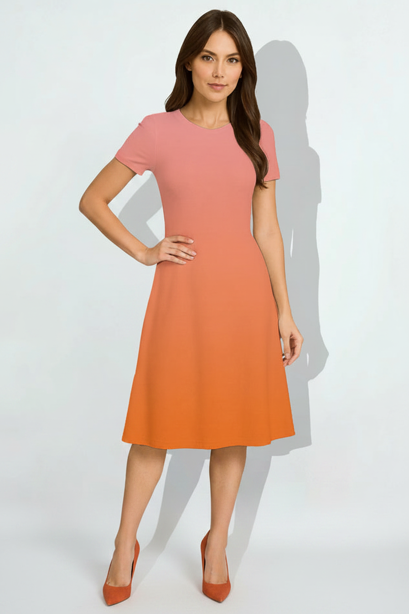 Peach Sunset A-Line Dress - fair-skinned Indian female model wearing peach sunset A-line dress, matching heels, white studio background