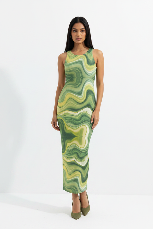 Verdant Wave Bodycon Dress - wheatish-toned Indian female model wearing green abstract wave print bodycon dress, nude heels, white studio background