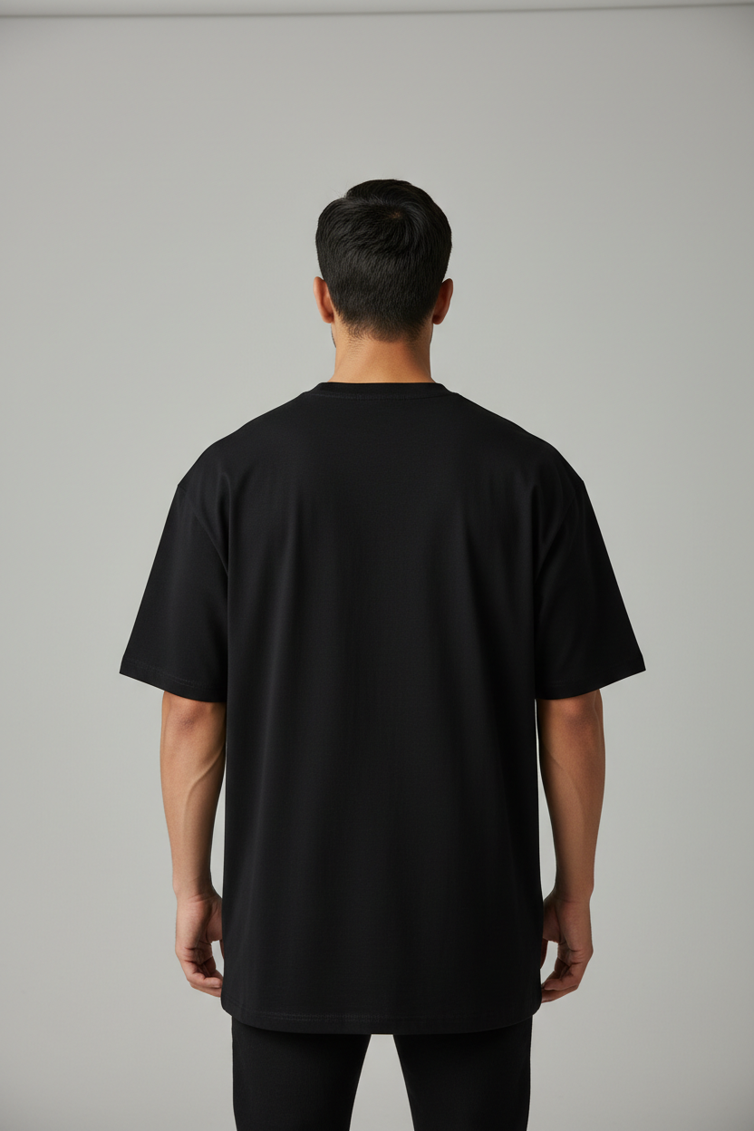 Awakened Vessel Oversized T-Shirt – Black – Back – Indian Male Model