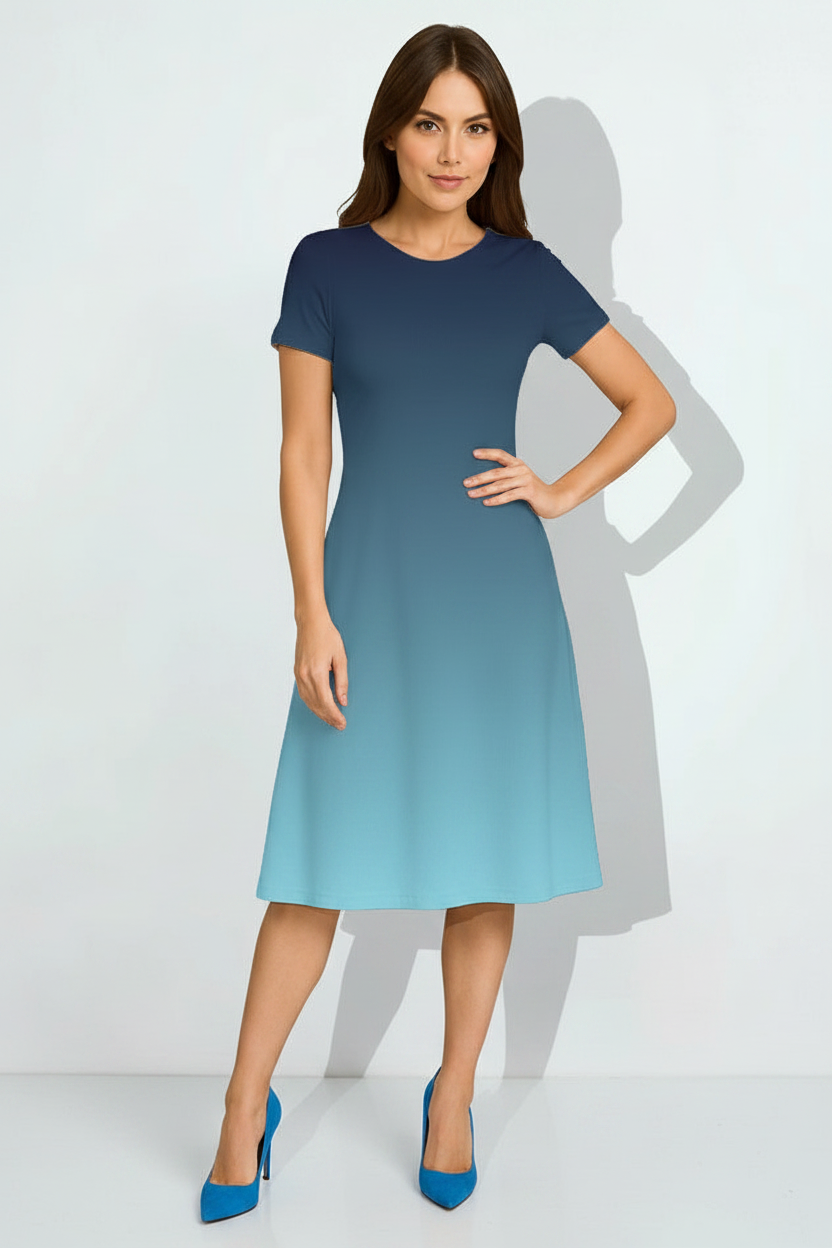 Indian female model wearing Coastal Glow A-Line Dress in studio setting, confident hand-on-hip pose, full body shot