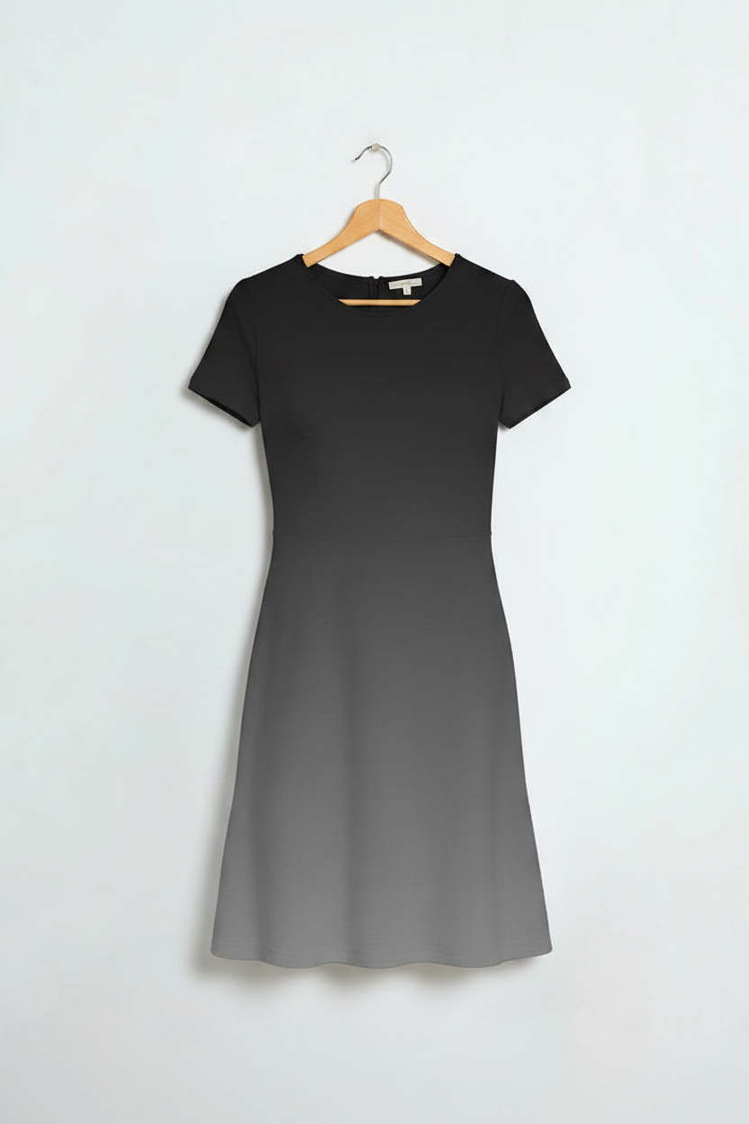 Ash Ombre A-Line Dress hanging on a light wood hanger, clean minimal background, product-only shot