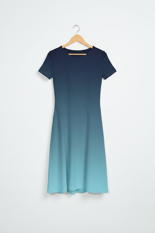 Coastal Glow A-Line Dress hanging on a light birch wood hanger, navy blue-to-sky blue gradient, clean minimal white background, product-only shot