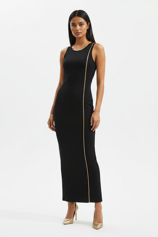 Noir Edge Bodycon Dress - wheatish-toned Indian female model wearing black bodycon dress with gold side stripe, gold heels, white studio background