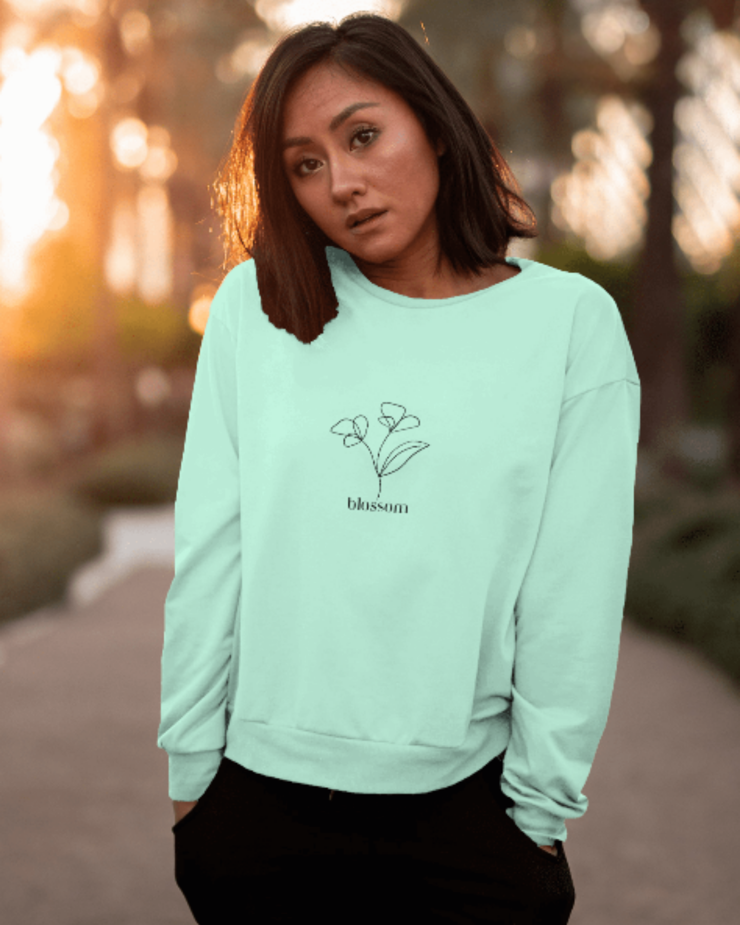 Women’s Regular Fit Sweatshirt with Blossom Floral Graphic Dark Edition sweatshirt regular fit cotton fabric heavyweight fabric printed design detail view by HAViT Apparel